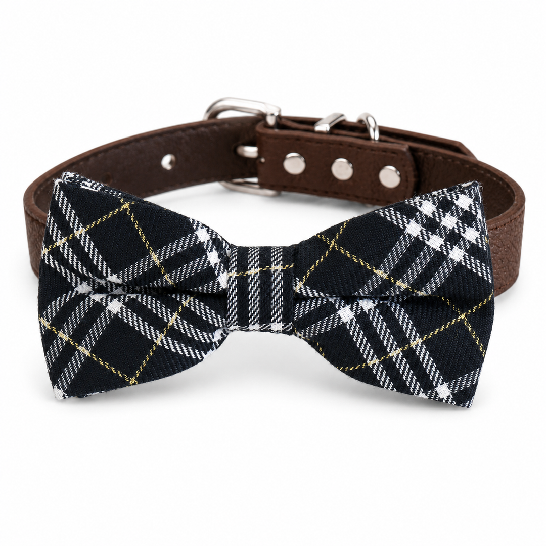 Black tartan ring bearer dog bow tie attached to a brown vegan leather dog collar with silver-tone buckle and hardware