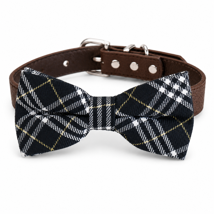 Black tartan ring bearer dog bow tie attached to a brown vegan leather dog collar with silver-tone buckle and hardware