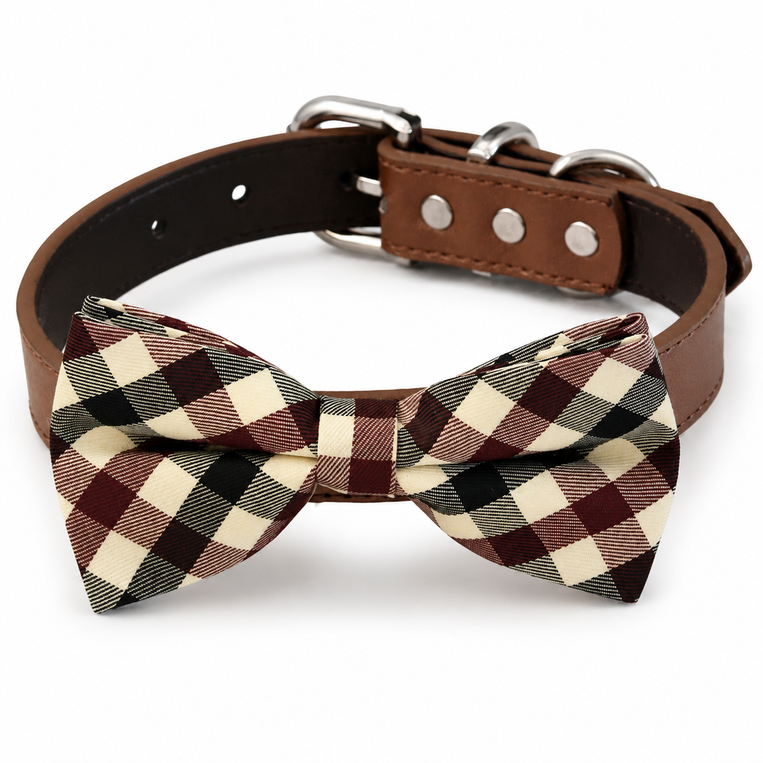 Brown plaid dog bow tie attached to a brown vegan leather dog collar with silver-tone hardware for everyday wear and special occasions.