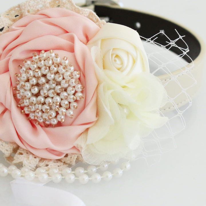 Blush pink ring bearer dog collar with pearl flower centerpiece, ivory rose accents, lace details, pearl strand, and crystal ring holder charm