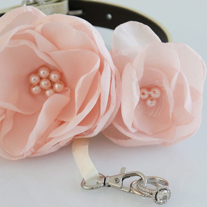 Close-up of blush pink flower dog collar with pearl center accents and detachable ring bearer holder