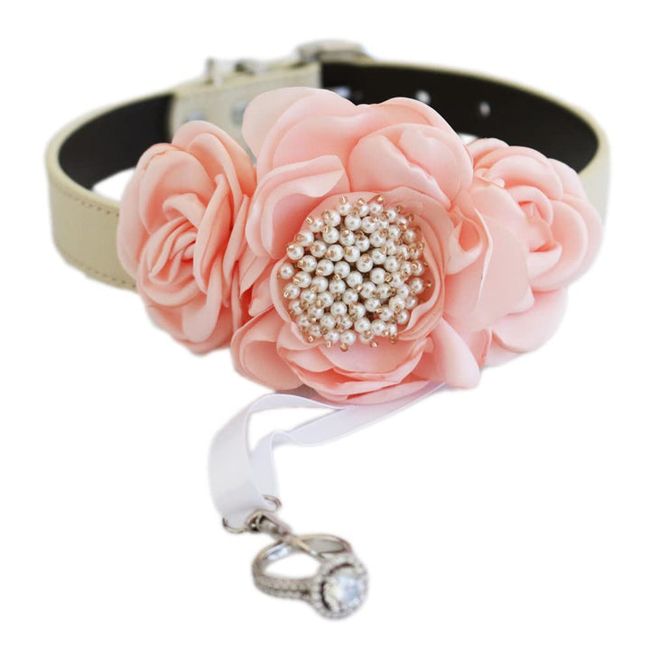 Handmade blush pink flower dog collar featuring layered fabric roses, pearl center detail, and elegant wedding styling