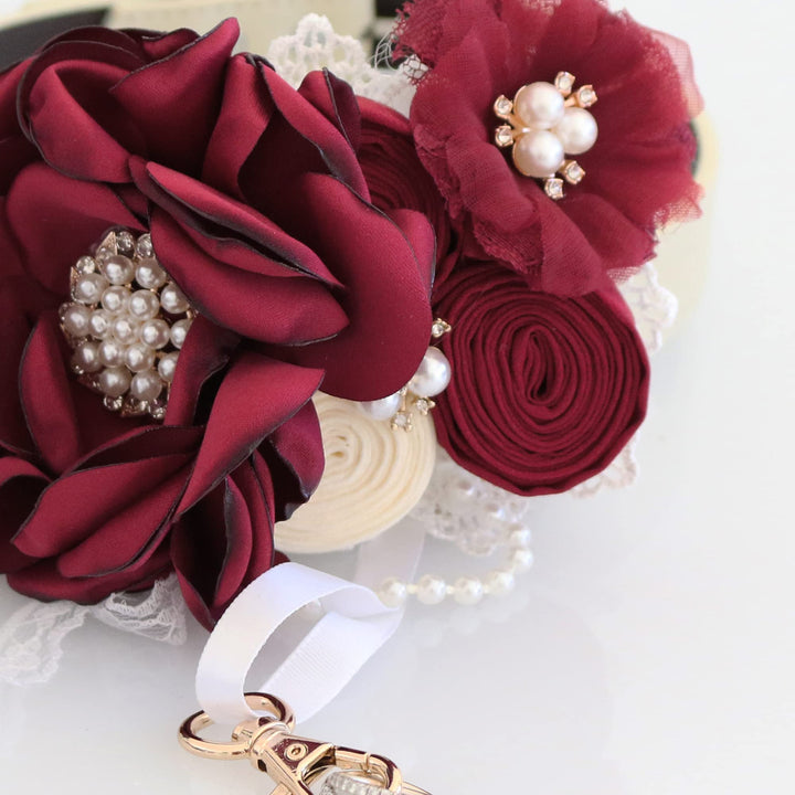 Burgundy ring bearer dog collar with handcrafted flowers, pearl accents, lace details, and decorative ring holder ribbon