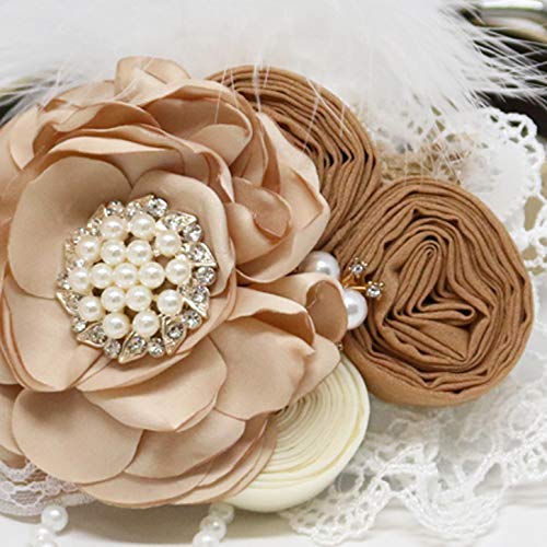 Close-up of champagne floral ring bearer dog collar with pearl center flower, rosette accents, lace trim, and feather detail.
