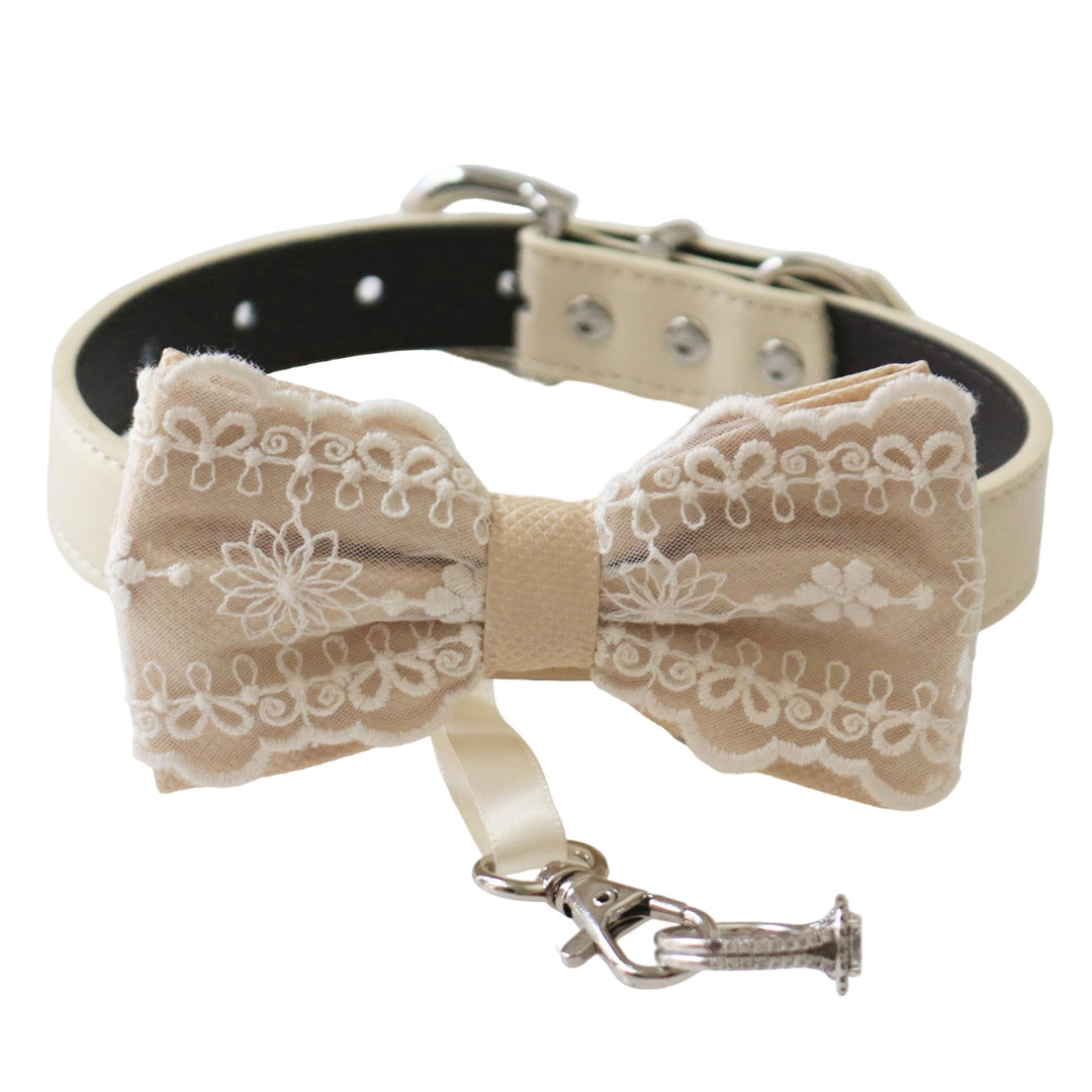 Champagne lace ring bearer dog bow tie collar with embroidered lace design, attached wedding ring holder ribbon, decorative ring charm, and adjustable vegan leather collar for weddings and special occasions