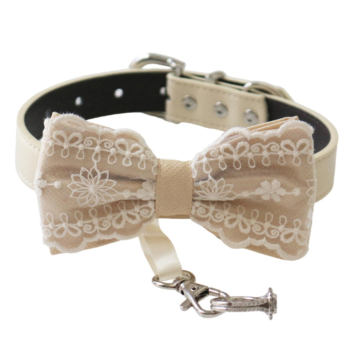 Champagne lace ring bearer dog bow tie collar with embroidered lace design, attached wedding ring holder ribbon, decorative ring charm, and adjustable vegan leather collar for weddings and special occasions