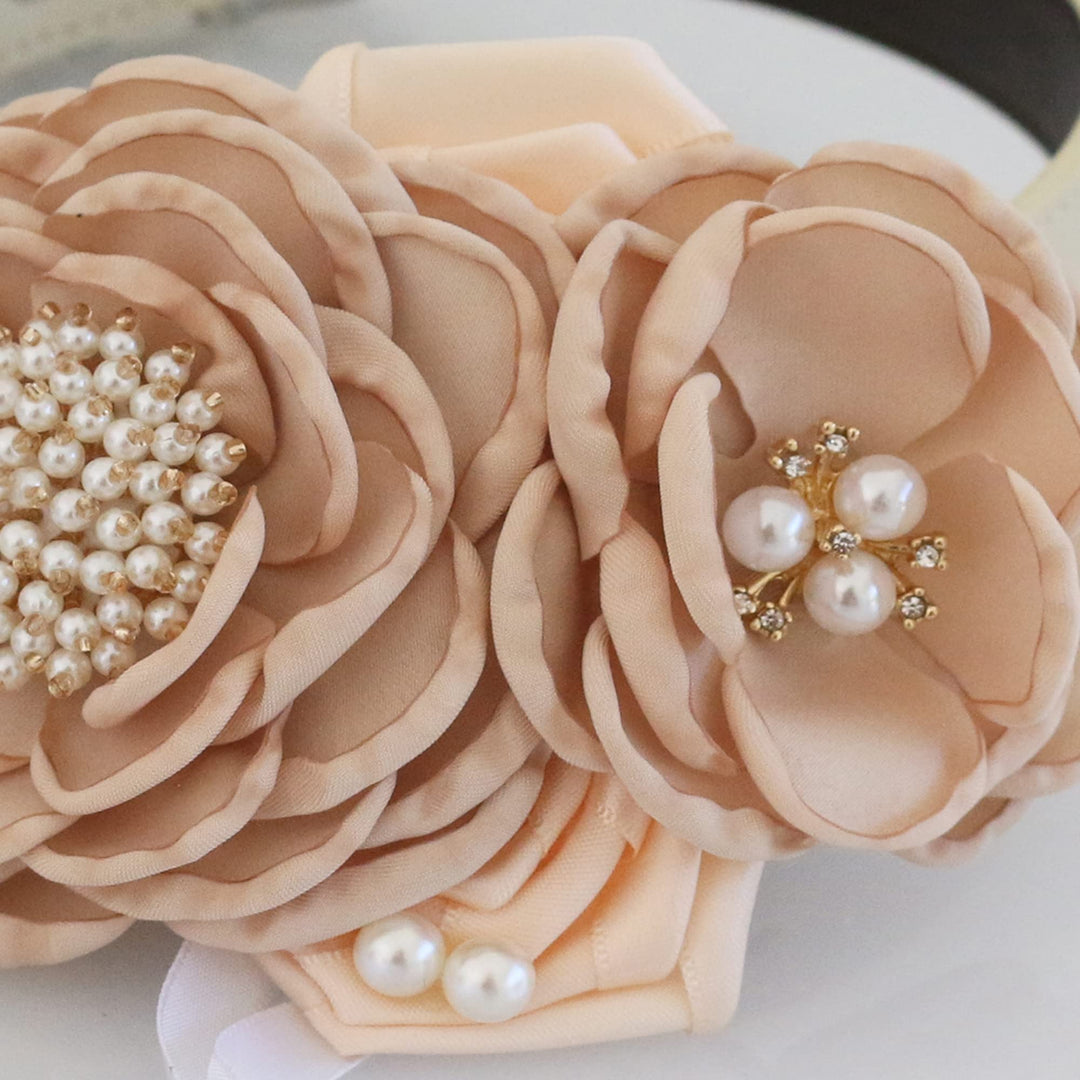 Champagne floral ring bearer dog collar with pearl flower centers, layered fabric flowers, and decorative wedding ring charm