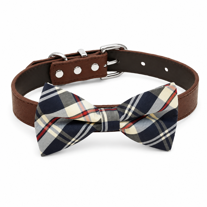 Plaid dog bow tie collar with navy, cream, and red tartan pattern, brown vegan leather collar, and silver-tone hardware