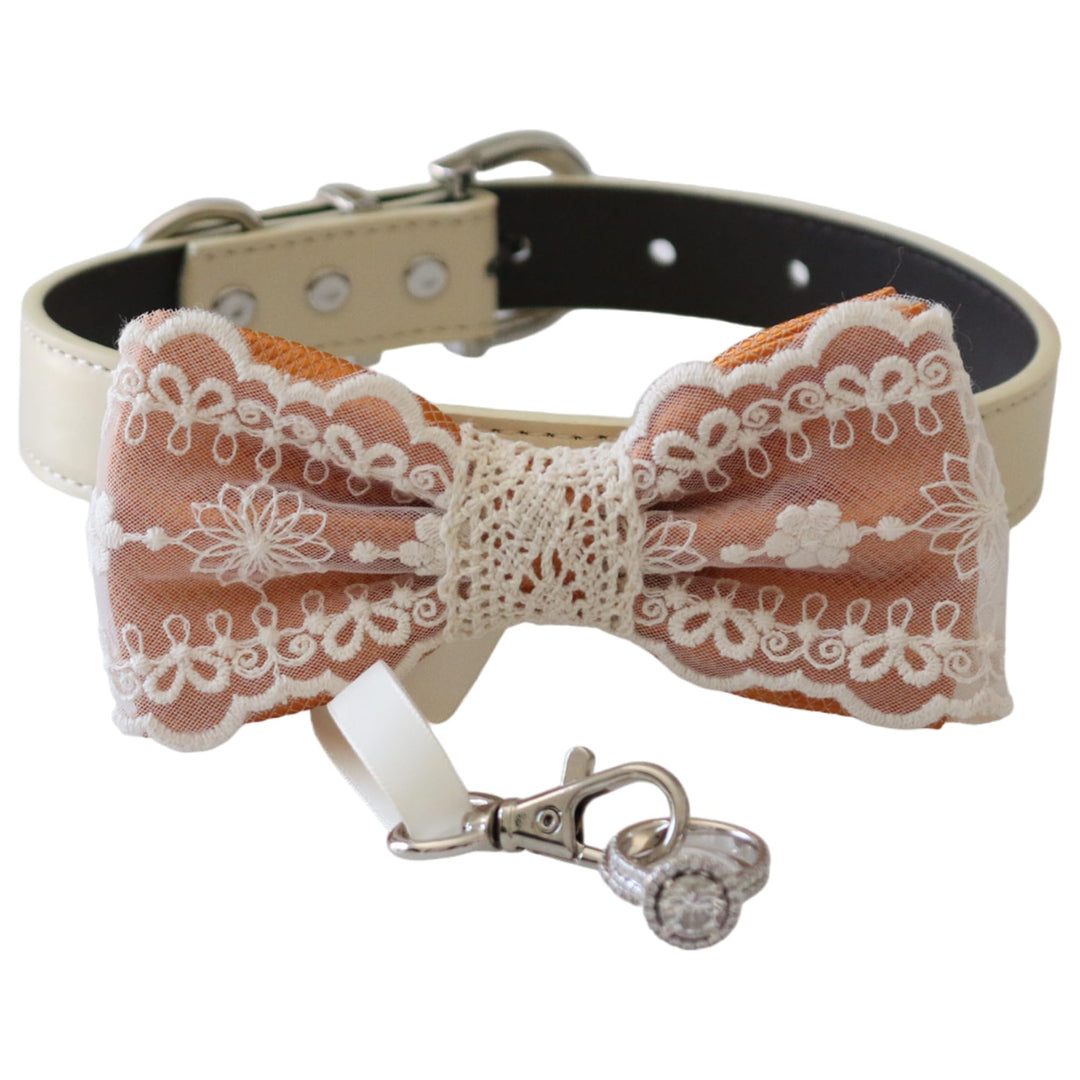 Copper lace ring bearer dog bow tie collar with floral embroidered lace overlay, cream vegan leather collar, and attached wedding ring holder ribbon