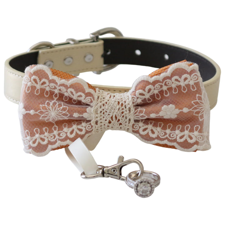 Copper lace ring bearer dog bow tie collar with floral embroidered lace overlay, cream vegan leather collar, and attached wedding ring holder ribbon