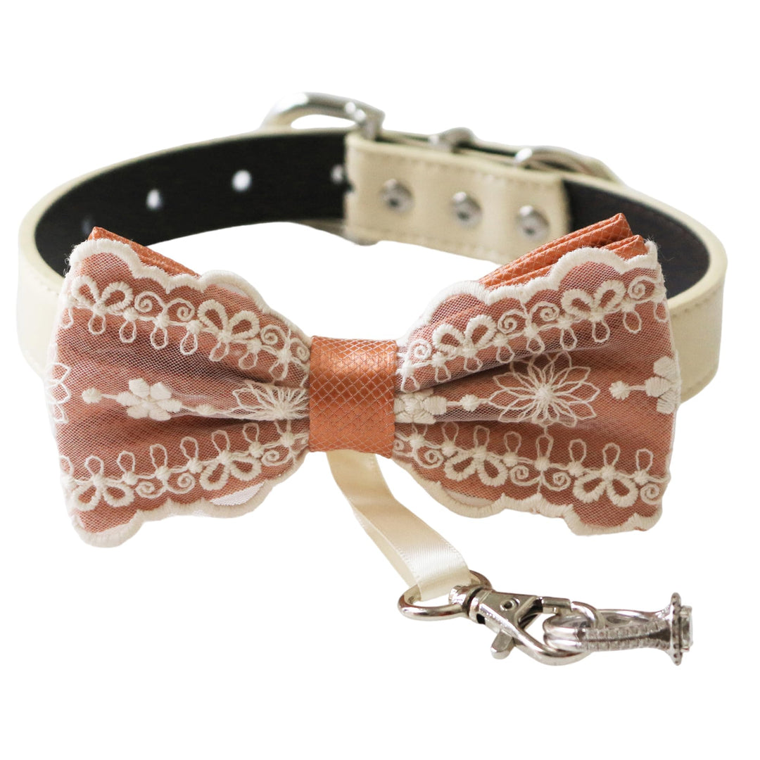 Copper lace ring bearer dog bow tie collar featuring embroidered floral lace pattern, attached wedding ring holder ribbon, decorative ring charm, and adjustable vegan leather collar for weddings and formal ceremonies