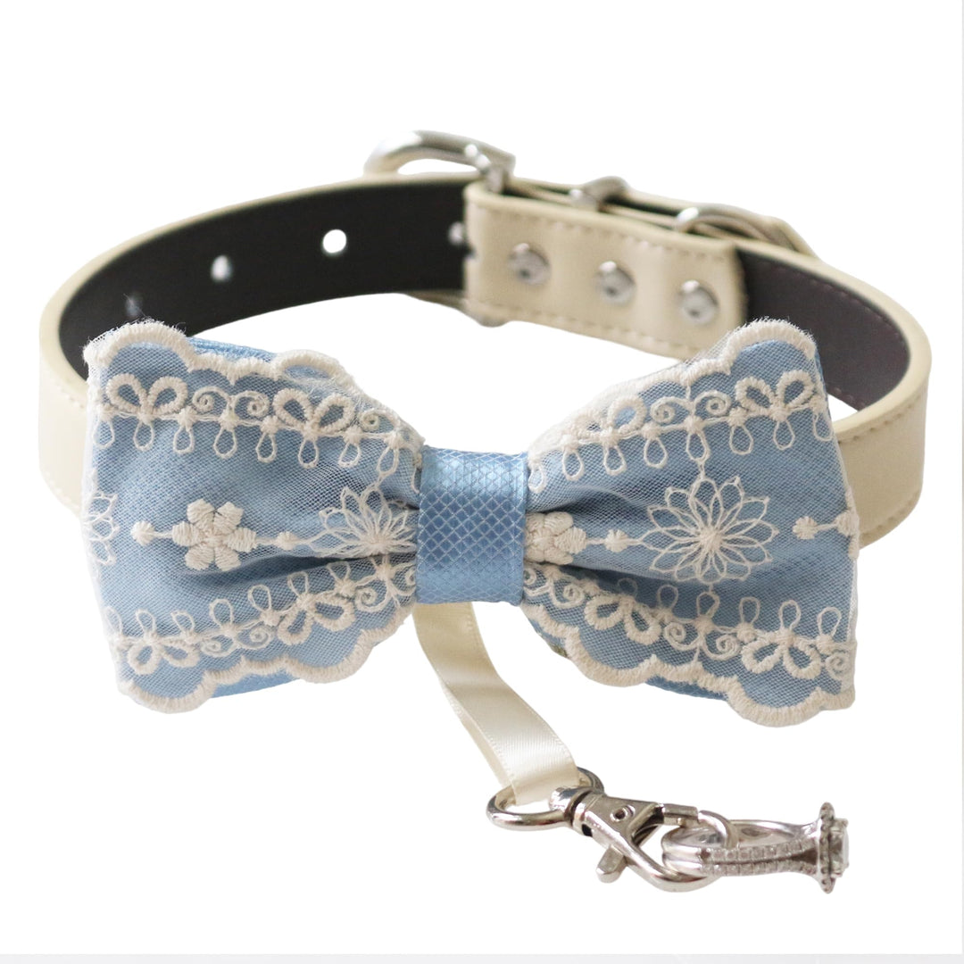 Dusty blue ring bearer dog bow tie collar featuring elegant lace embroidery, satin center wrap, vegan leather collar, and attached wedding ring holder ribbon for weddings and formal events