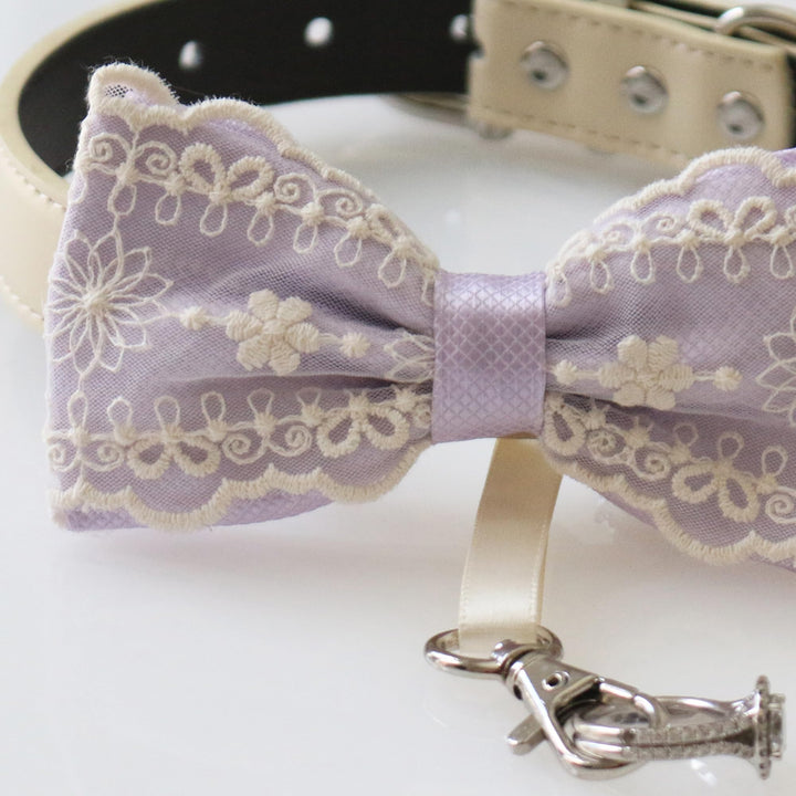 Dusty lavender lace ring bearer dog bow tie close-up featuring embroidered floral lace details, scalloped edges, and soft lavender center band