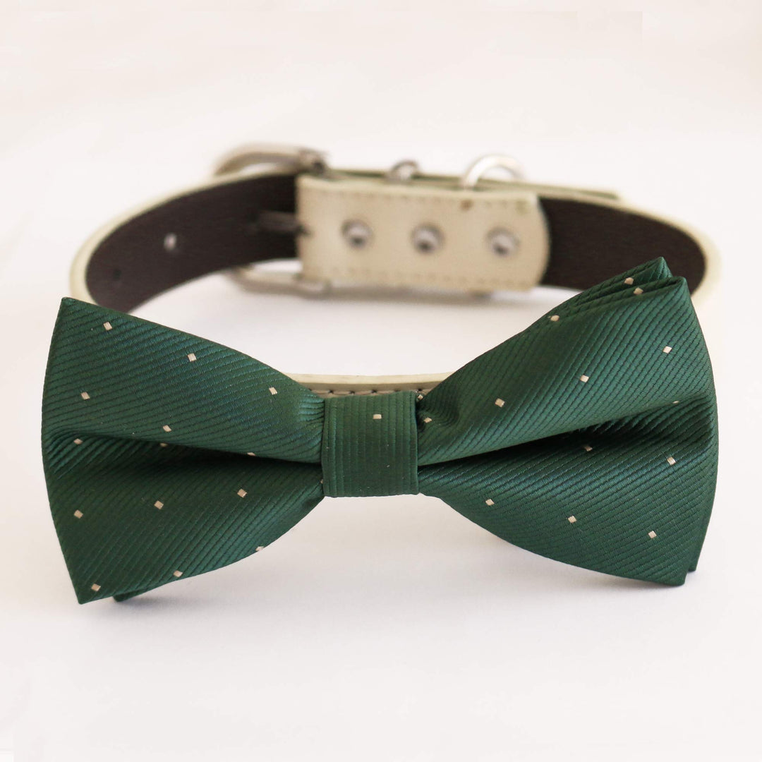 Emerald green satin dog bow tie with subtle micro dot pattern attached to an ivory vegan leather dog collar