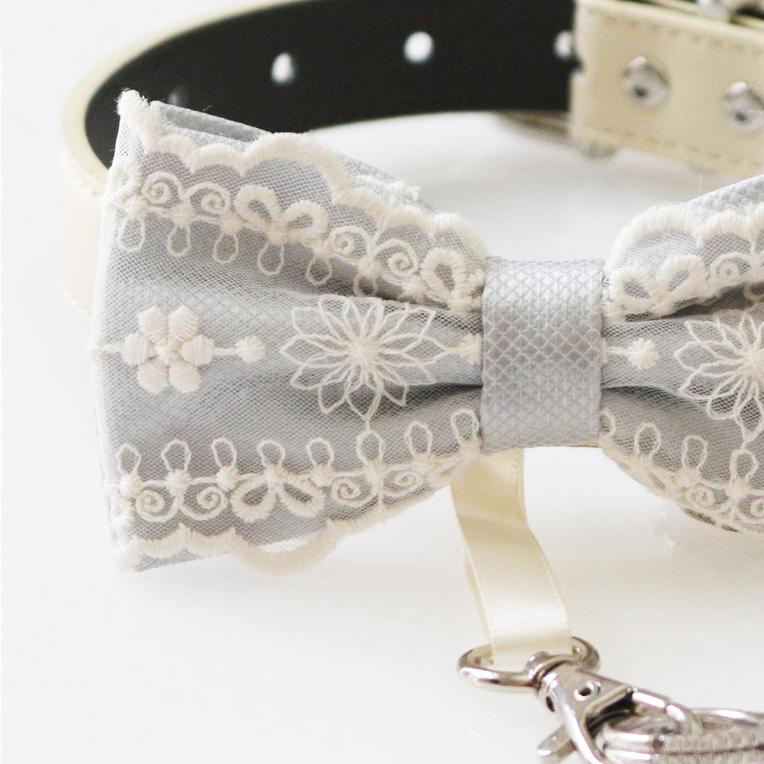 Gray lace ring bearer dog bow tie collar with embroidered floral lace overlay, silver gray satin center accent, adjustable vegan leather collar, and attached wedding ring holder ribbon