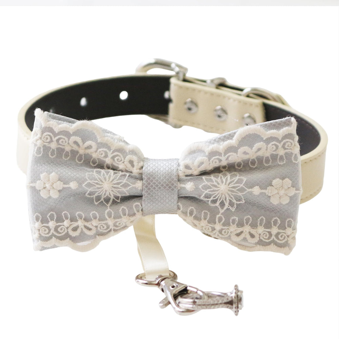 Gray ring bearer dog bow tie collar featuring floral embroidered lace details, satin center wrap, vegan leather collar, and attached wedding ring holder ribbon for weddings and formal events
