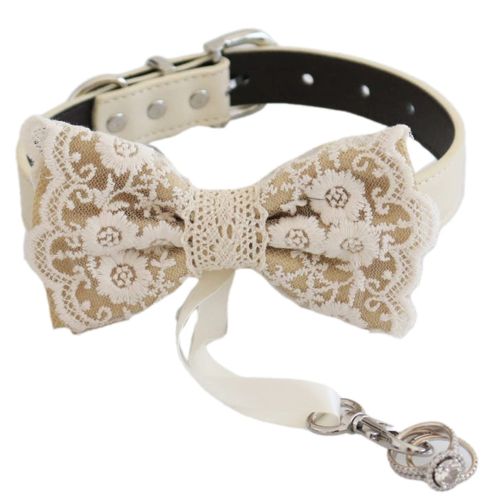Ivory floral lace ring bearer dog bow tie collar featuring embroidered floral lace pattern, attached wedding ring holder ribbon, decorative ring set, and adjustable vegan leather collar for weddings and formal ceremonies