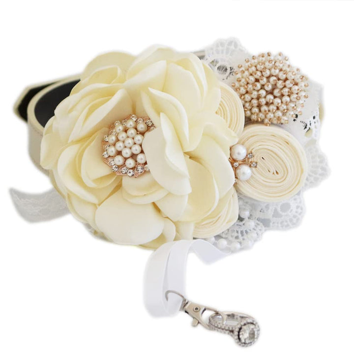 Ivory floral dog collar featuring pearl cluster detail, rolled rosette flowers, lace trim, and removable ribbon ring holder.
