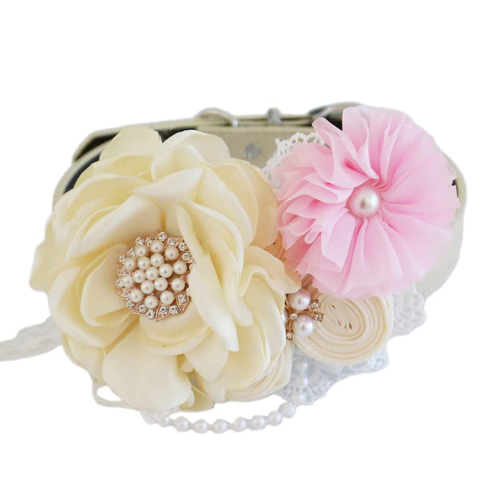 Wedding dog collar featuring an ivory flower centerpiece, pink chiffon flower, pearl embellishments, and lace details.