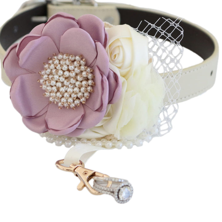 Handmade lilac flower and ivory rose dog wedding collar featuring pearl details, lace accents, and elegant ring bearer attachment.