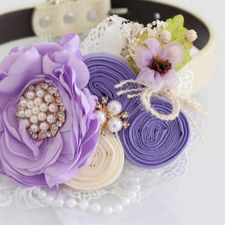 Close-up of lilac floral ring bearer dog collar with ribbon roses, pearl accents, lace trim, and rustic flower detail.