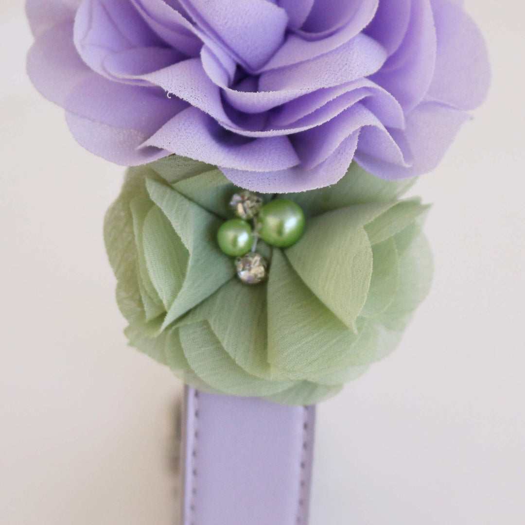 Close-up of lilac and sage green floral dog collar with pearl and crystal accents.