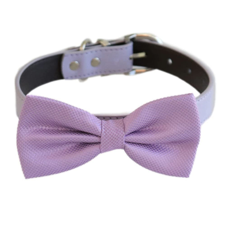 Lilac satin dog bow tie attached to a matching lilac vegan leather collar with silver-tone hardware