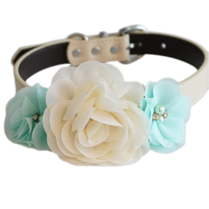 Handmade dog flower collar featuring an ivory rose centerpiece and mint fabric flowers with pearl embellishments.