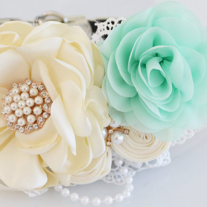 Ivory floral dog collar with mint rose accent, pearl centerpiece, lace trim, and decorative pearl details.