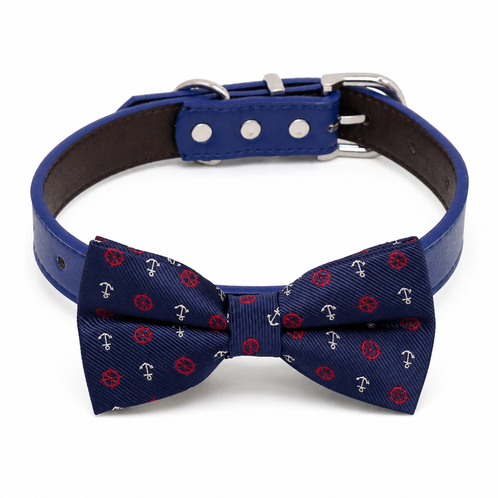 Blue dog bow tie collar with nautical anchor and ship wheel pattern, blue vegan leather collar, and silver-tone hardware