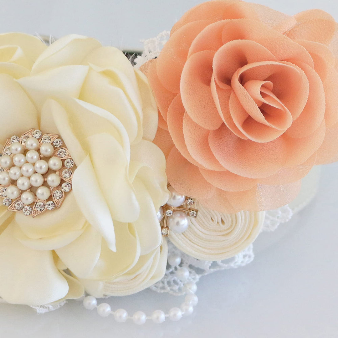 Ivory floral dog collar with peach rose accent, pearl centerpiece, lace trim, and decorative pearl details.