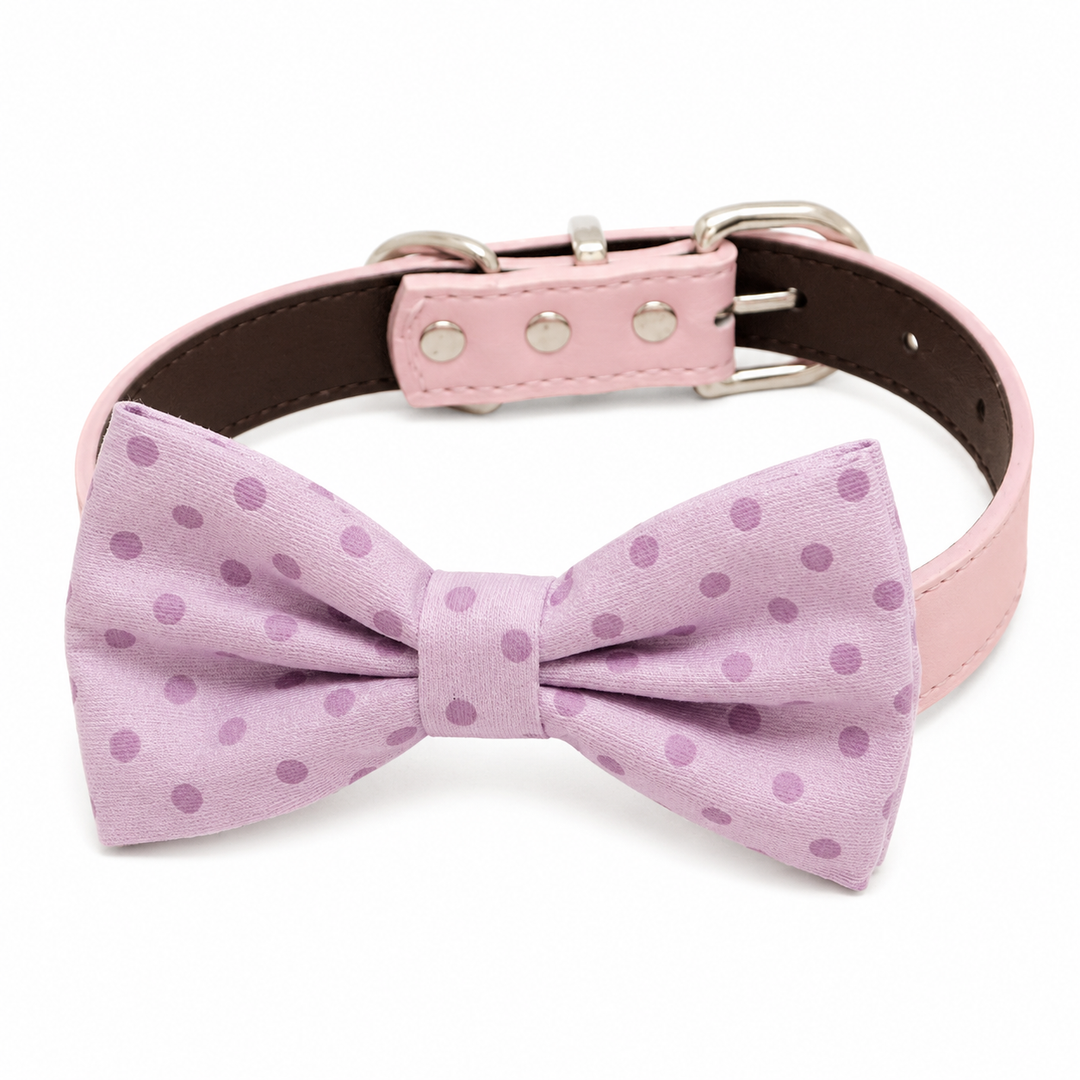 Pink polka dot dog bow tie attached to a matching pink vegan leather collar with silver-tone hardware