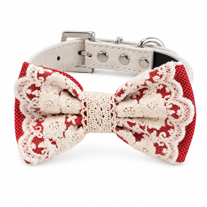 Handmade red lace dog bow tie attached to an ivory vegan leather dog collar