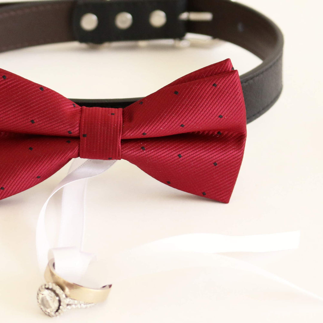 Red ring bearer dog bow tie collar with subtle black dot pattern and white ribbon ring holder.
