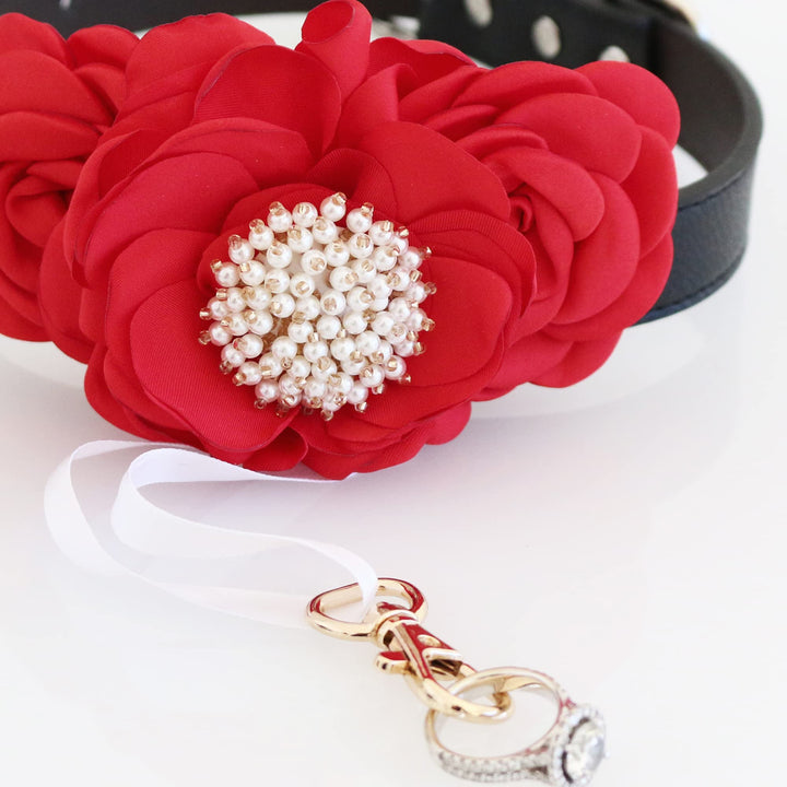 Red floral ring bearer dog collar with pearl flower center, white ribbon, and crystal ring holder clasp