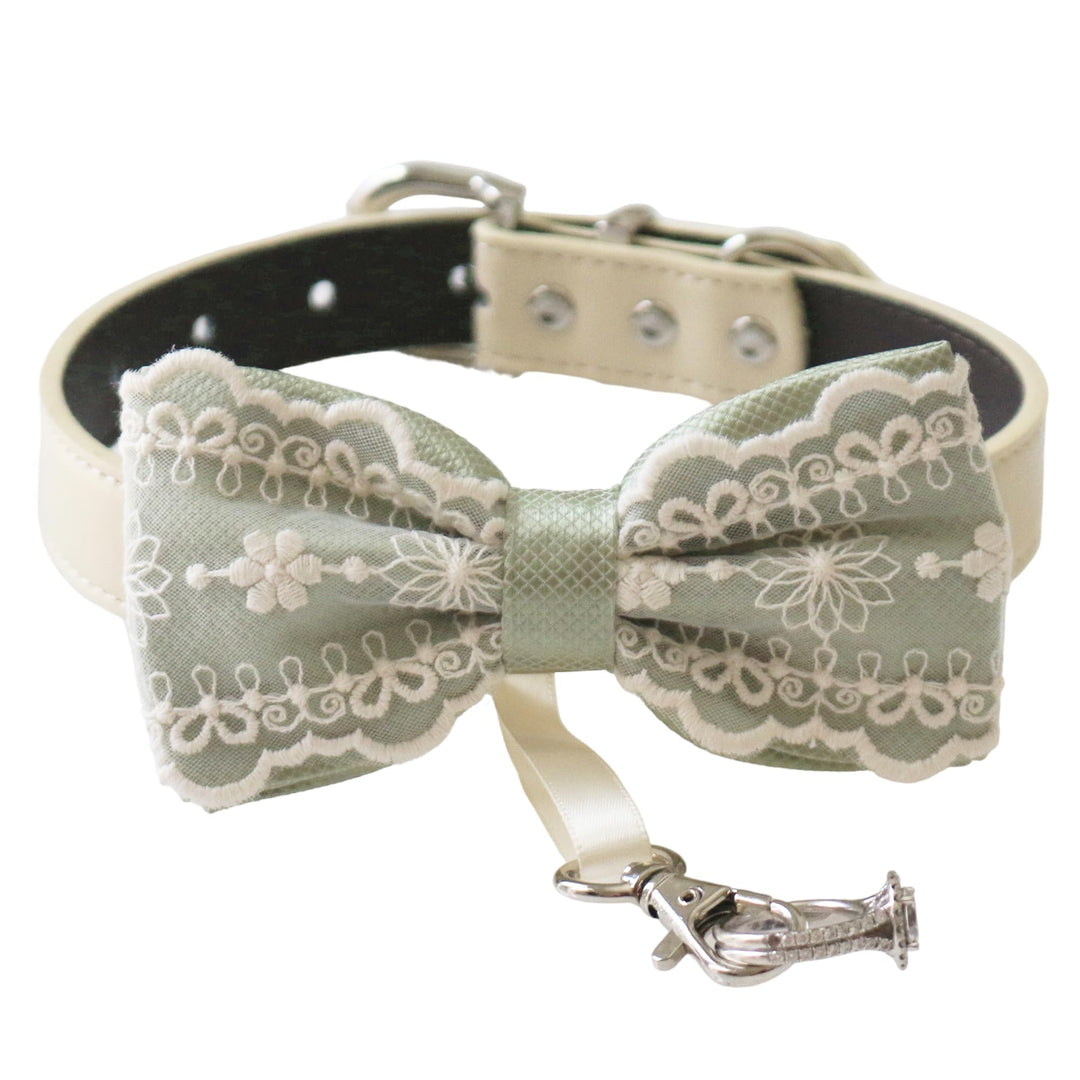 Sage green ring bearer dog bow tie collar featuring elegant lace embroidery, satin center wrap, vegan leather collar, and attached wedding ring holder ribbon for weddings and formal events
