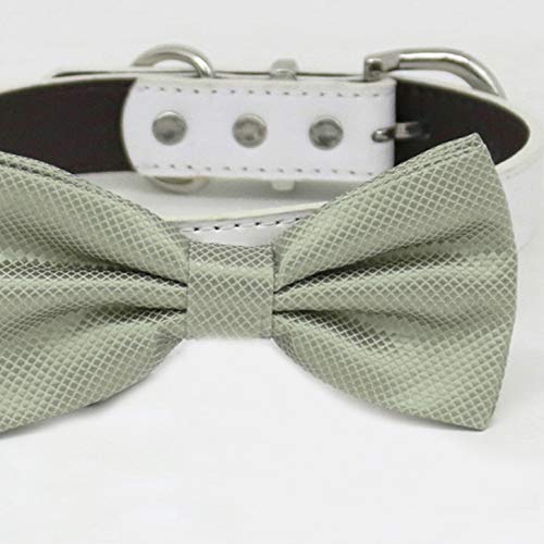 Sage green textured dog bow tie attached to a white vegan leather collar with silver hardware.