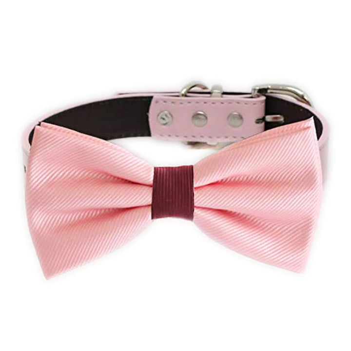 Soft pink satin dog bow tie collar featuring a burgundy center band, pink vegan leather collar, and silver-tone hardware.
