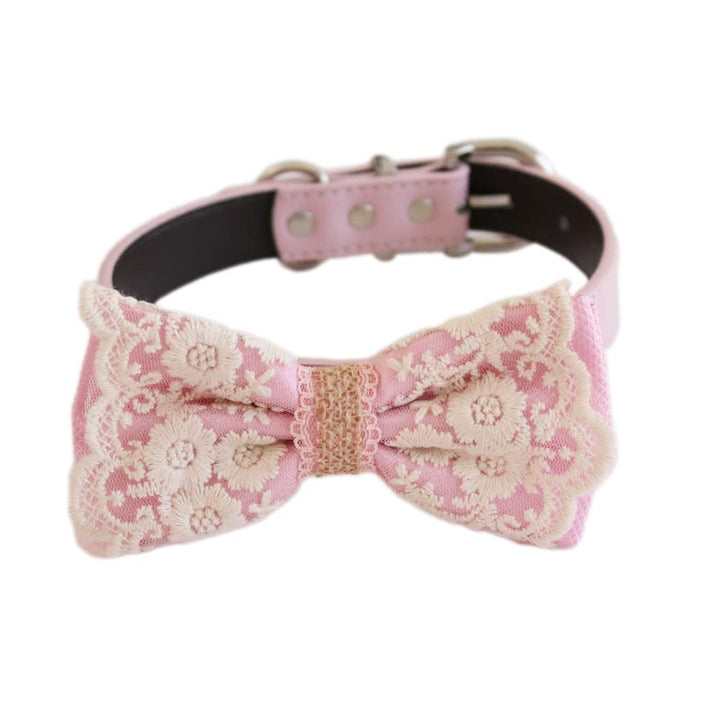 Soft pink floral lace ring bearer dog bow tie collar with embroidered floral lace overlay, pink vegan leather collar, adjustable buckle, and attached wedding ring holder ribbon