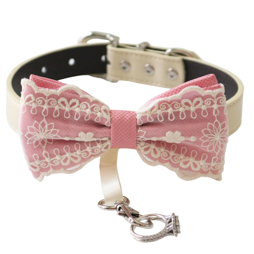 Soft pink lace ring bearer dog bow tie collar with embroidered floral lace details, ivory vegan leather collar, adjustable fit, and attached wedding ring holder ribbon