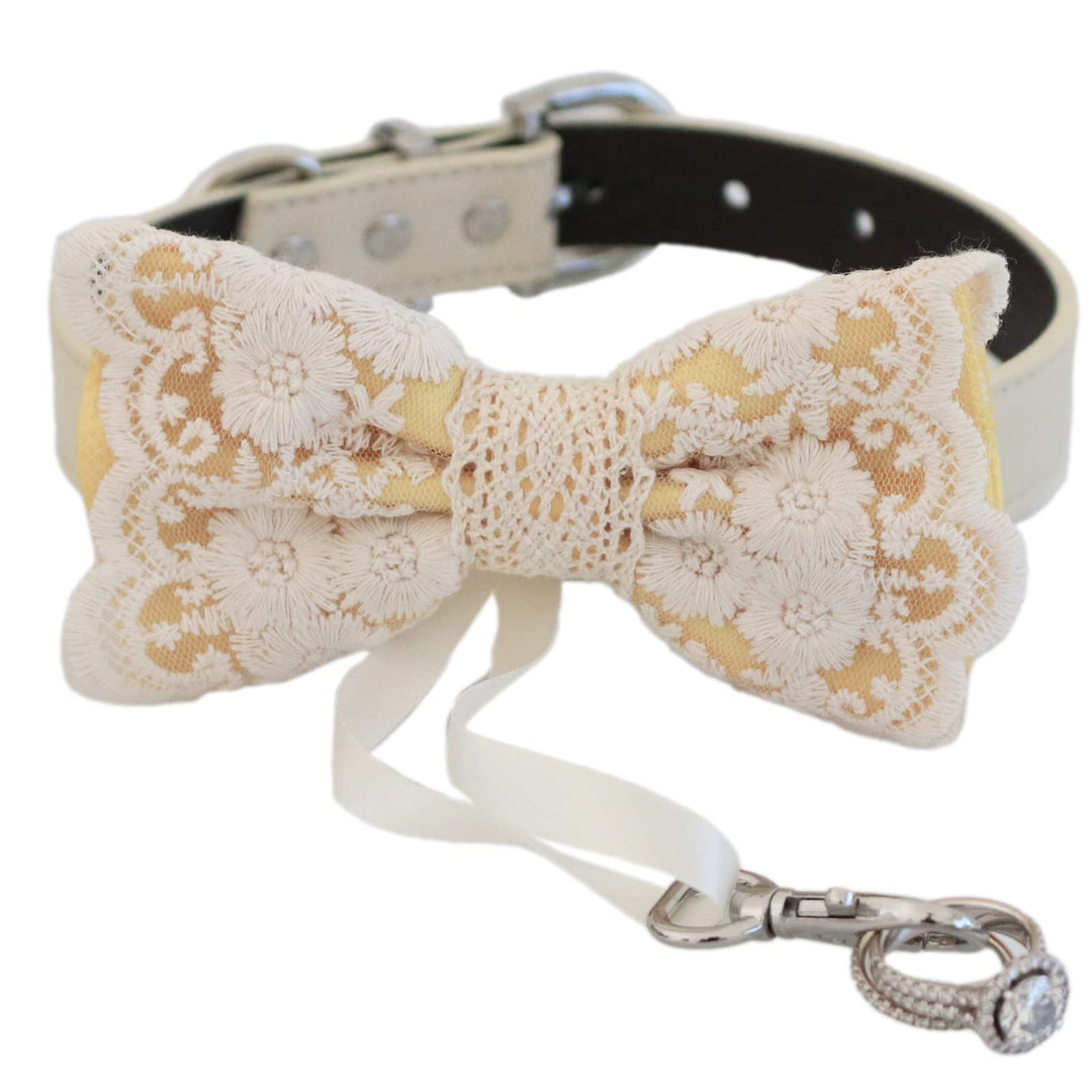 Yellow lace dog bow tie collar with embroidered floral lace overlay, ivory vegan leather collar, adjustable fit, and attached ring bearer ribbon