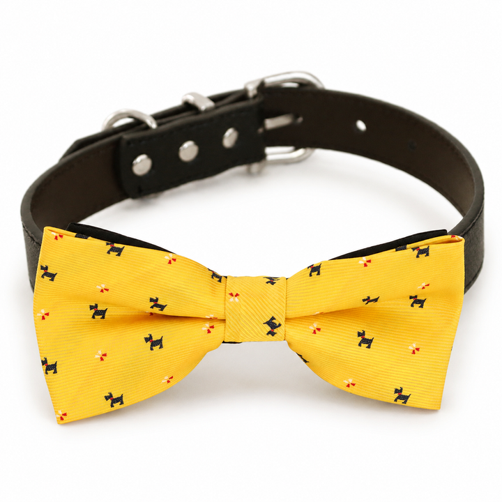 Yellow dog bow tie collar with Scottie dog print pattern, black vegan leather collar, and silver-tone hardware