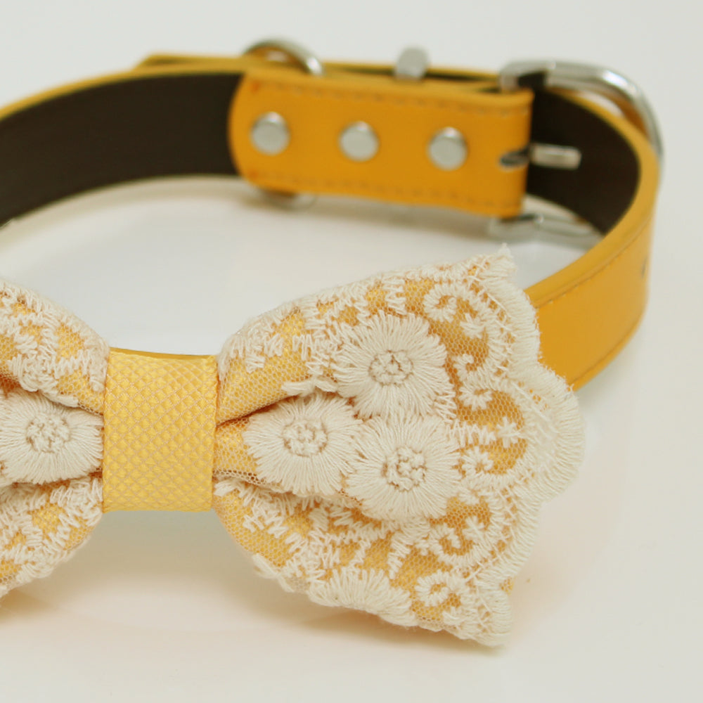 Close-up view of antique gold dog bow tie collar featuring embroidered floral lace details, textured center wrap, and premium craftsmanship