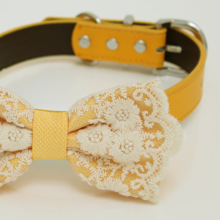 Close-up view of antique gold dog bow tie collar featuring embroidered floral lace details, textured center wrap, and premium craftsmanship