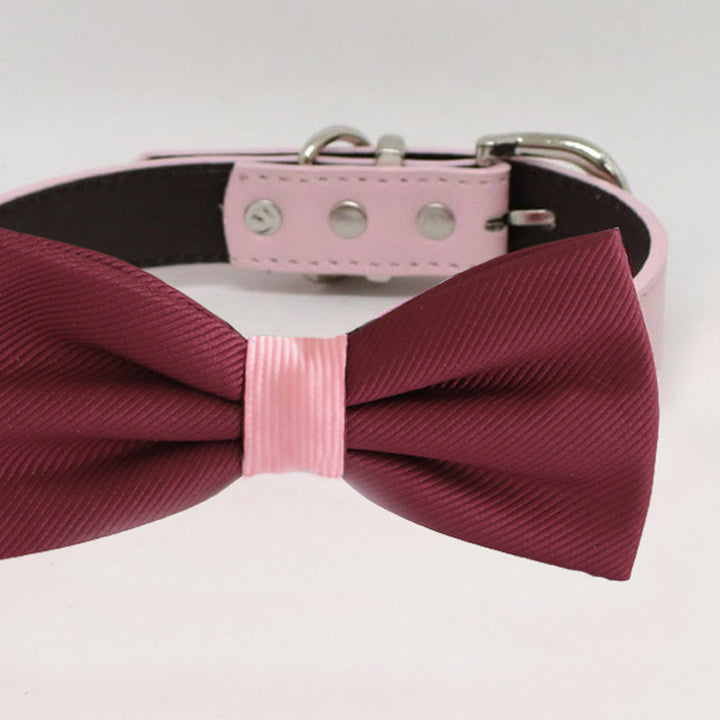 Close-up view of burgundy dog bow tie with blush pink center accent and blush vegan leather collar