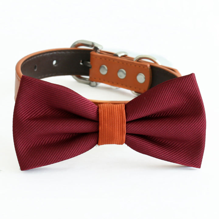 Burgundy ribbed dog bow tie with cinnamon center band attached to a cinnamon vegan leather collar