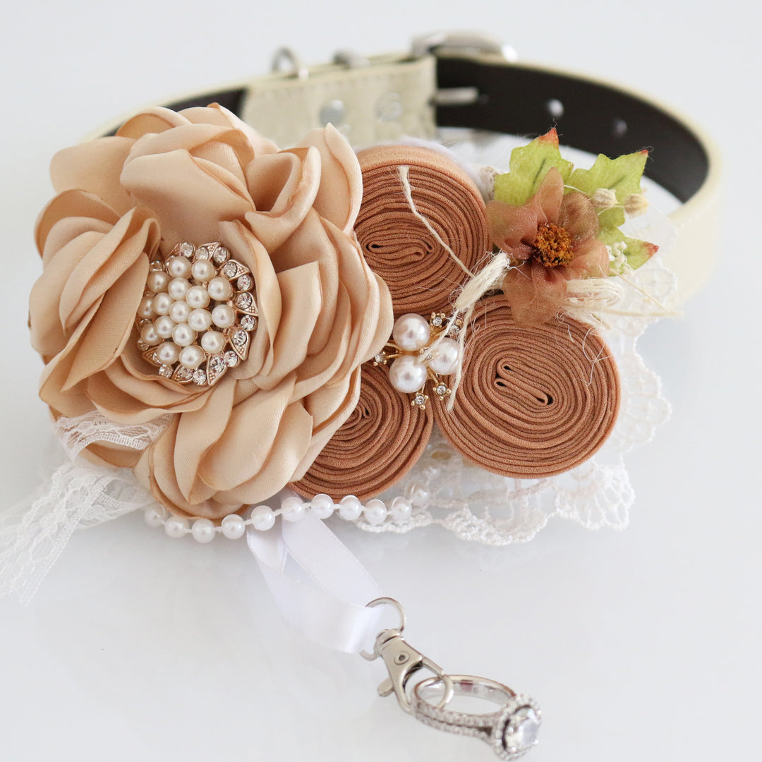 Champagne country ring bearer dog collar with handmade floral arrangement, pearl accents, lace trim, rustic flower embellishments, and decorative ring holder charm.