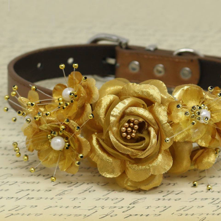 Close-up of gold floral dog collar featuring handcrafted satin flowers, pearl accents, and decorative bead details.