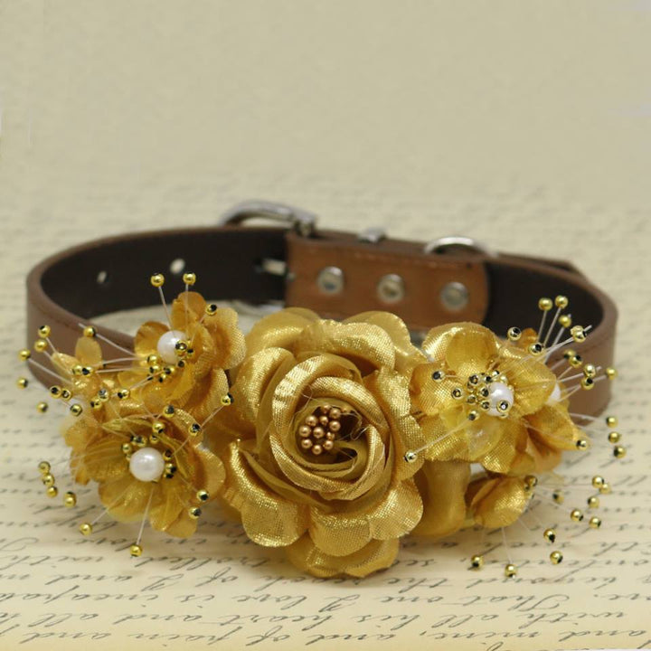 Handmade gold floral dog collar with satin flowers, pearl embellishments, and decorative bead accents for special occasions.