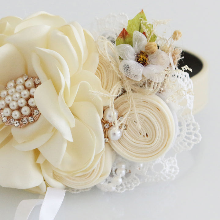 Ivory country-style floral ring bearer dog collar with pearl centerpiece, lace accents, dried flower detail, and ribbon ring holder.